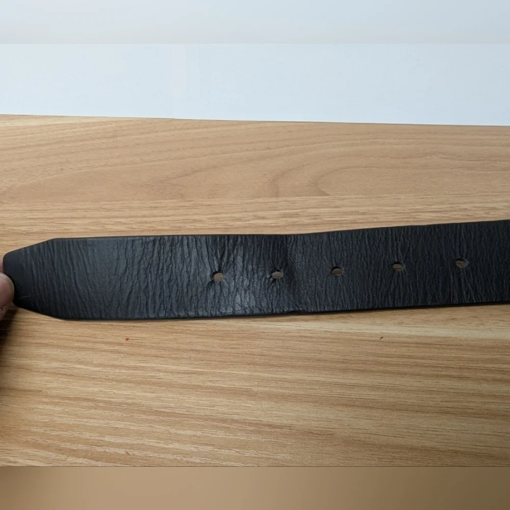 Black genuine leather belt in used condition